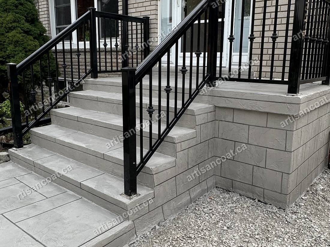 Decorative concrete front steps with stone-look treads after resurfacing Etobicoke