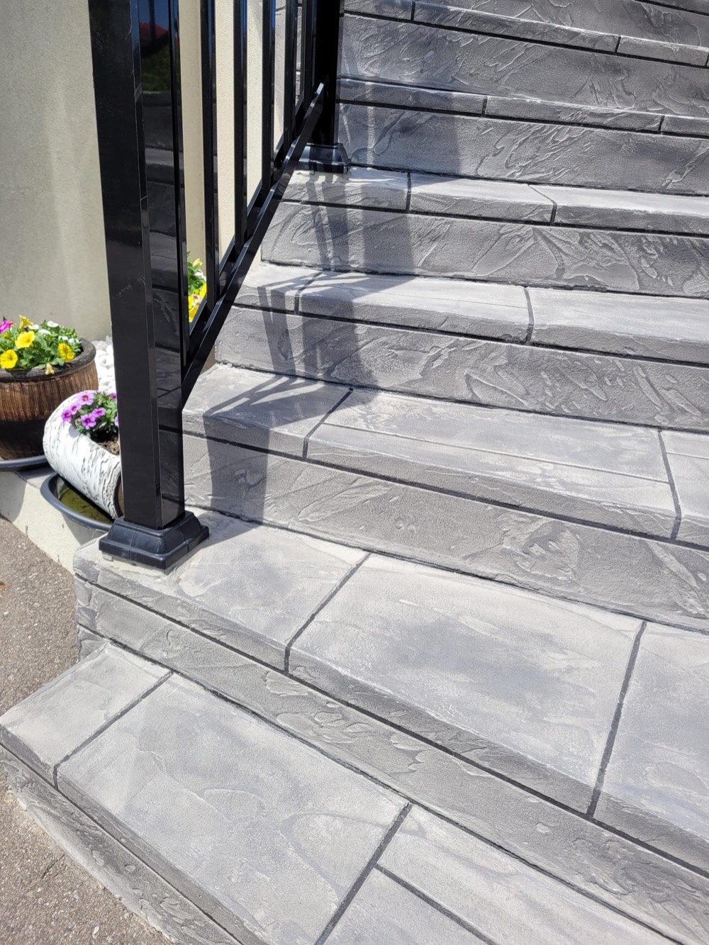 After: light gray stone-pattern Jewelstone grand staircase