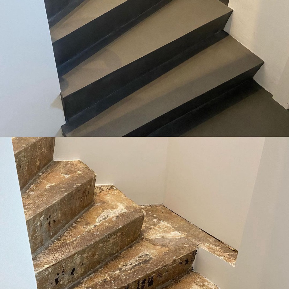 Microcement stairs with glass railing architectural