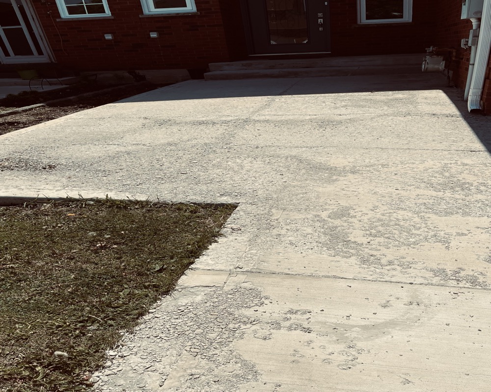 Old cracked driveway before resurfacing GTA